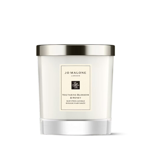 candela profumata al miele e ai fiori di nettarina